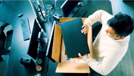 Person unboxing computer