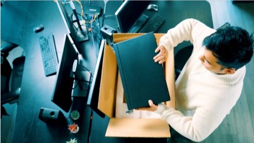 Person unboxing computer