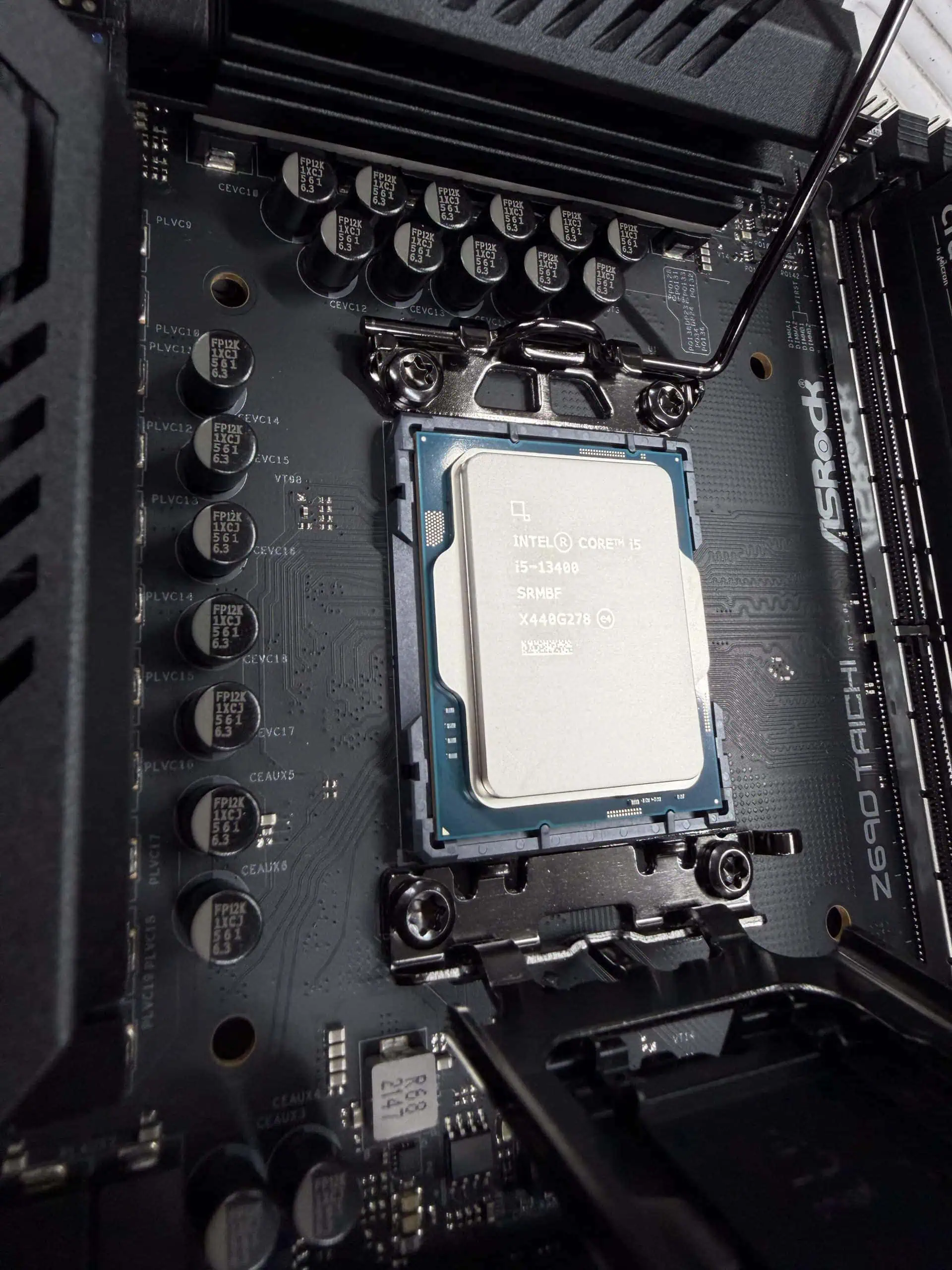CPU being fitted to motherboard