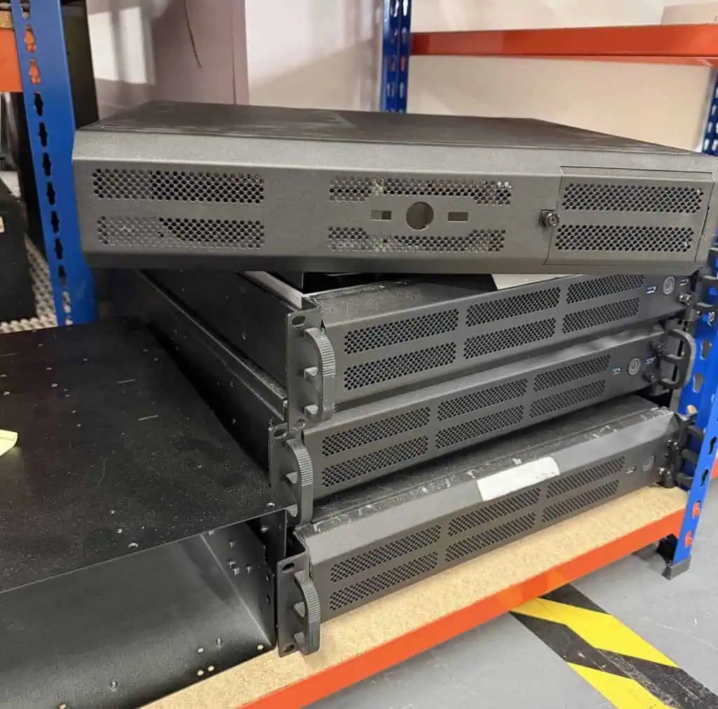 Stacked of saved old computer chasis